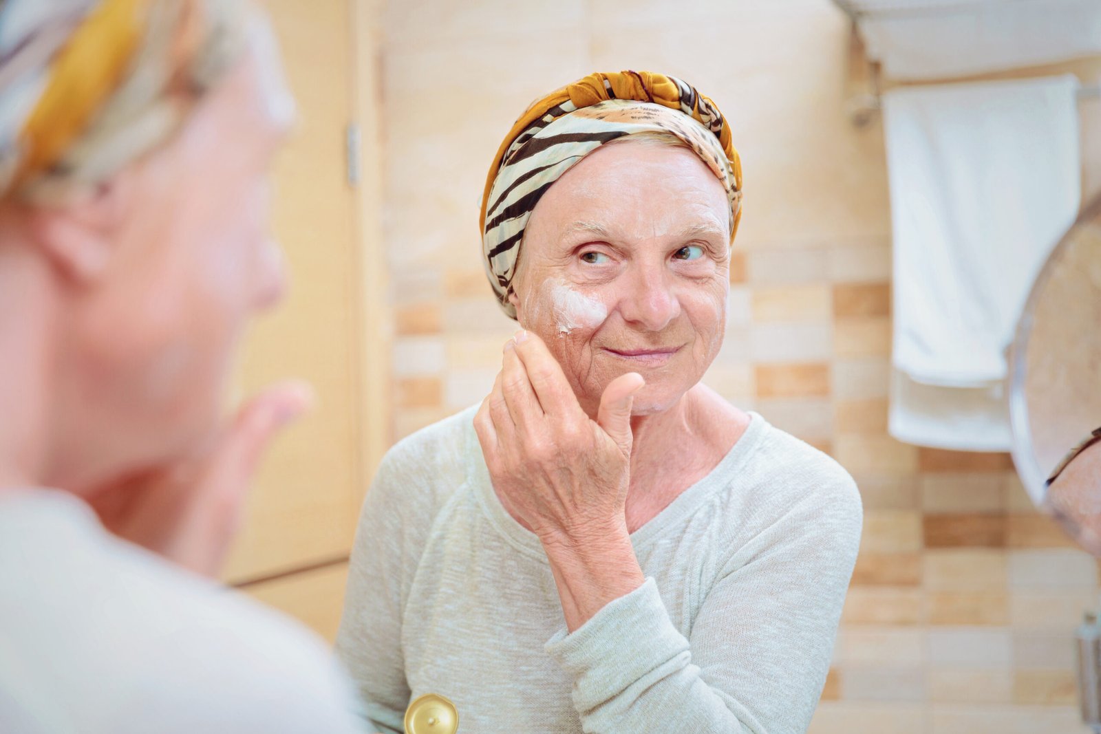 Woman with smooth skin after wrinkle softening treatment at Couture Dermatology and Laser Beverly Hills